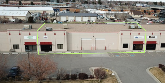 Aerial view of Industrial Property located at 5405 W 56th Ave in Arvada, Colorado. There is a green box outlining to unit for lease.